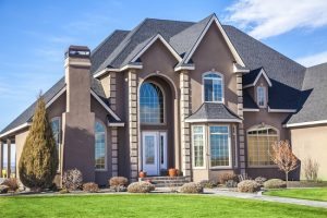 Modern two story house with multiple roofs